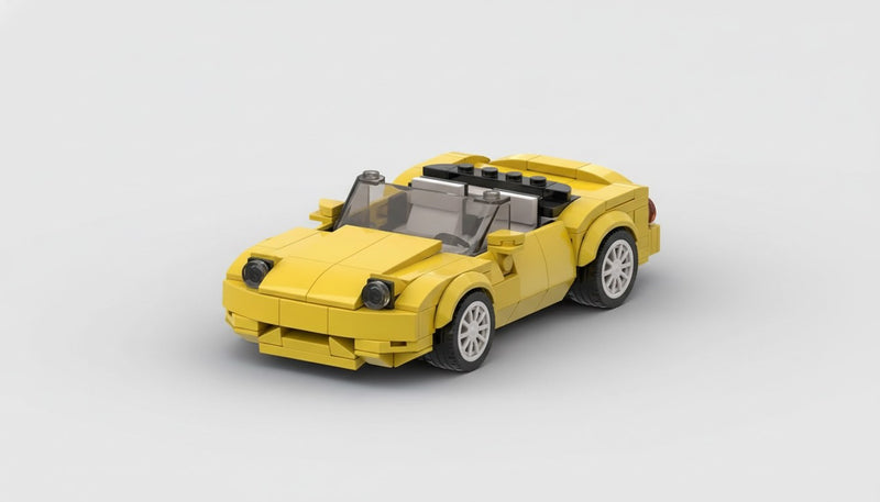 Mazda MX-5 (NA) · Gelbes Cabriolet
